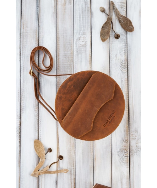 Okrągła torebka z postarzanej skóry typu Hunter - pomarańczowa