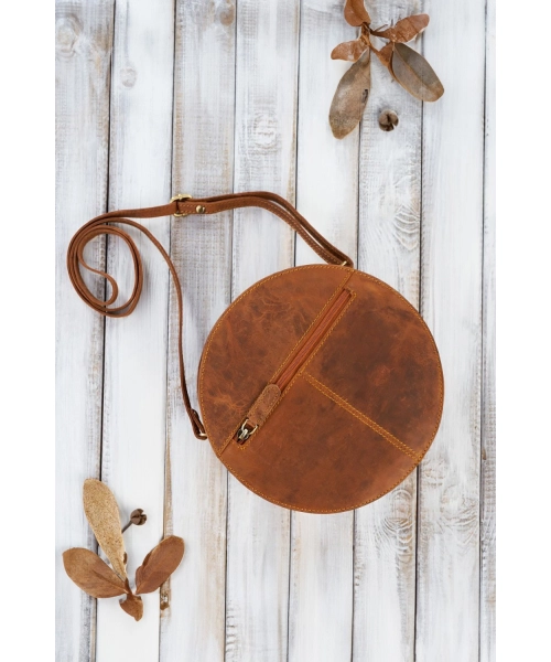 Okrągła torebka z postarzanej skóry typu Hunter - pomarańczowa